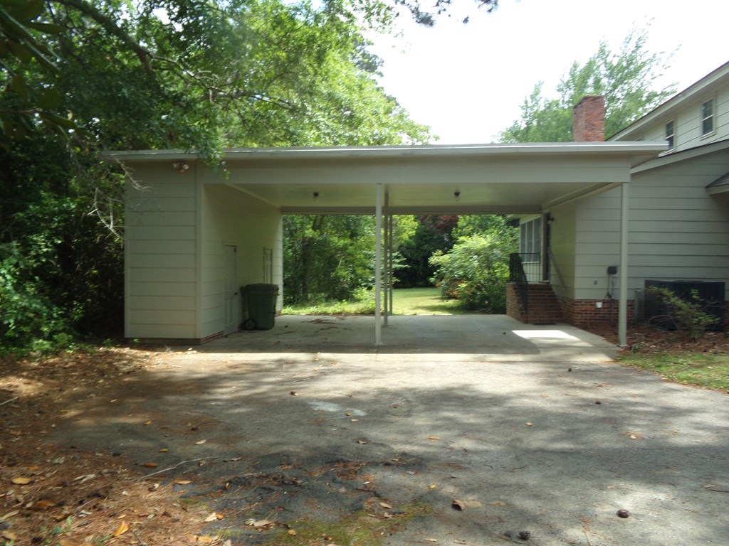 Attached carport and storage